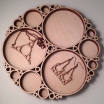 Apollonian - Jewelry and Tray designed using circle-packing algorithm, baltic birch, .75 x 12 x 12 in., 2015. Designed with Grasshopper in Rhino.